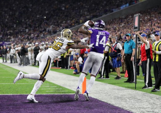 #14 Stefon Diggs of the Minnesota Vikings catches a touchdown in the Minnesota Vikings Vs New Orleans Saints matchup.