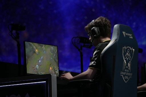 A member of European team G2 competes during the "League of Legends" videogame world championship final against Chinese team FPX