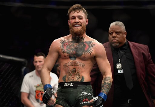 The Mac - Conor McGregor of Ireland laughs after the first round against Khabib Nurmagomedov of Russia