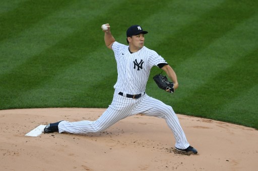 Masahiro Tanaka pitches for New York. Tanaka is a projected pitcher in the Rays vs Yankees Series.