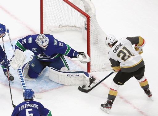 Coming up Canucks vs Golden Knights, on image Jacob Markstrom #25 of the Vancouver Canucks makes the save on Nick Cousins #21 of the Vegas Golden Knights in Game Four of the Western Conference Second Round
