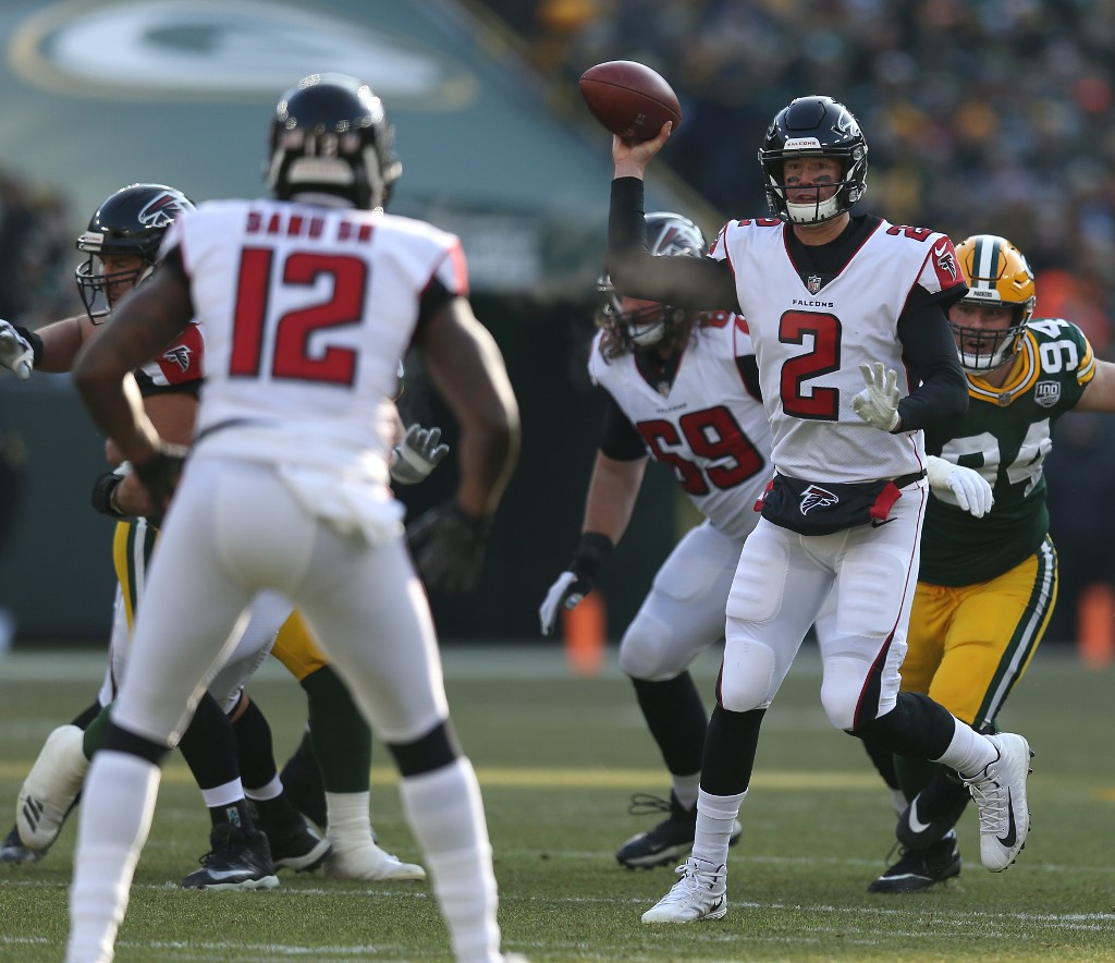 Matt Ryan of the Atlanta Falcons throws a pass to Mohamed Sanu during the first half of a game against the Green Bay Packers- NFL Week 4 Parlay