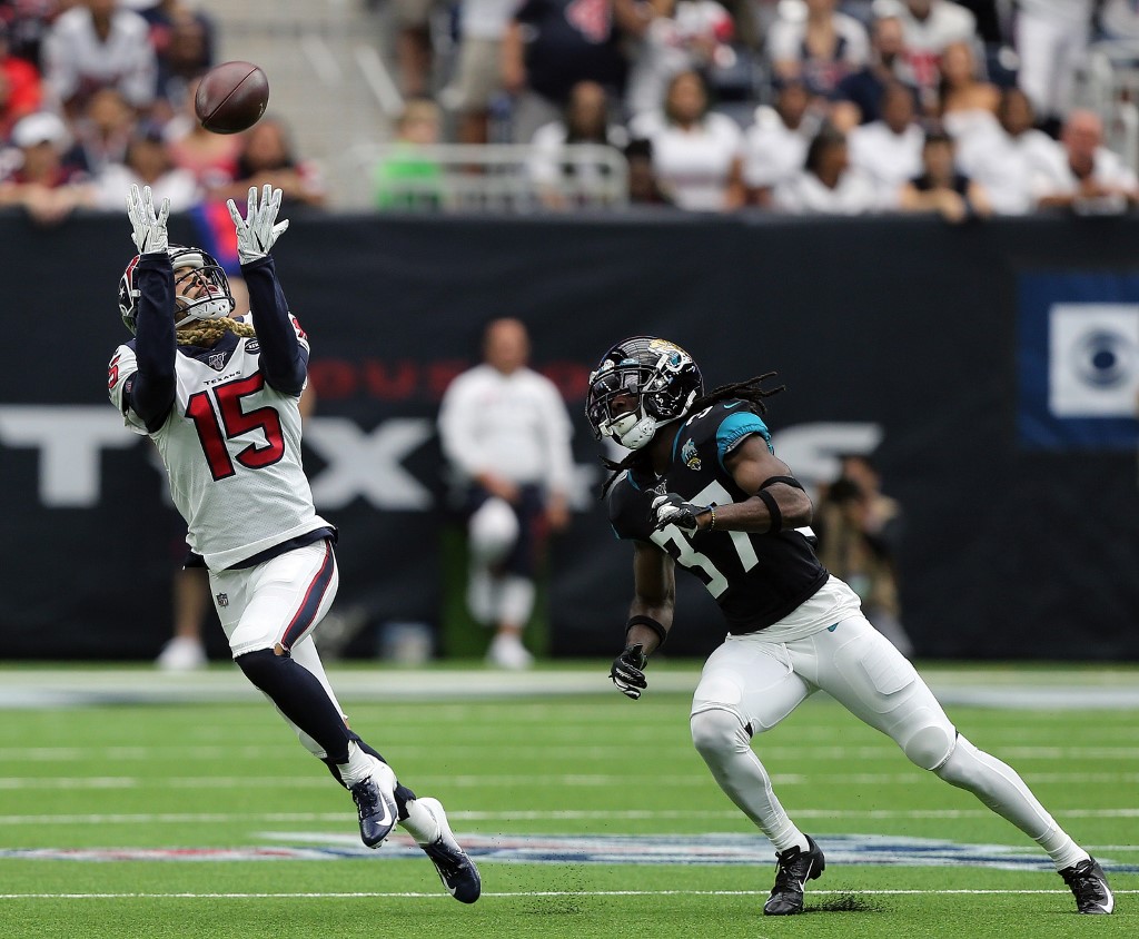 Will Fuller of the Houston Texans makes a catch in the second quarter as he beats Tre Herndon of the Jacksonville Jaguars on the play -Jaguars vs Houston Betting Advice
