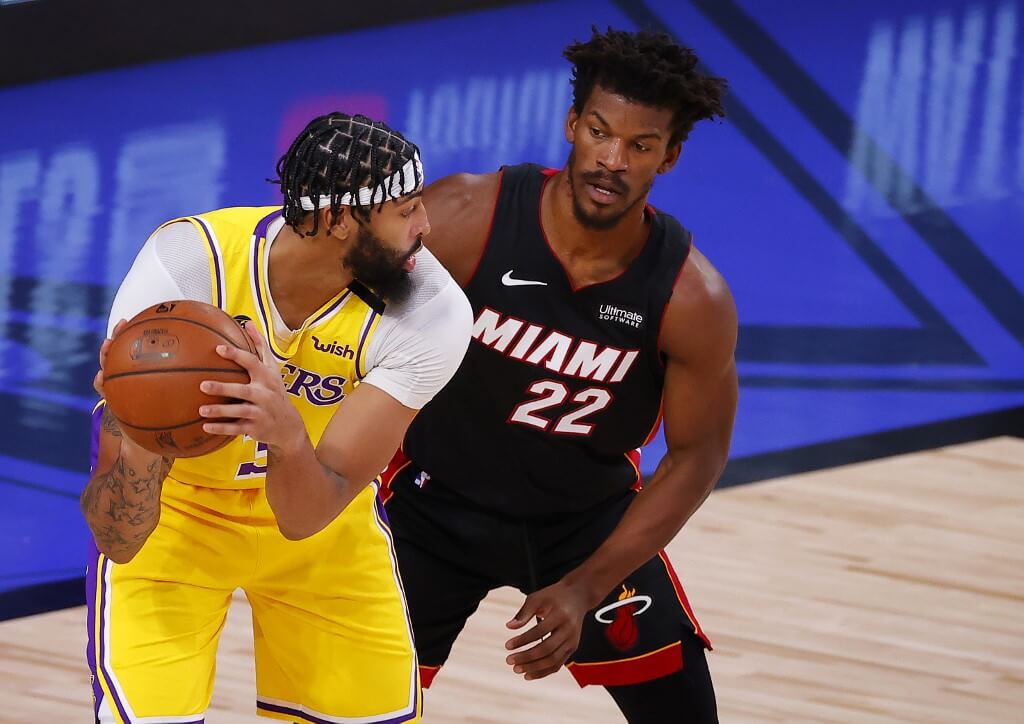 Anthony Davis of the Los Angeles Lakers drives against Jimmy Butler of the Miami Heat during the second quarter in Game One of the 2020 NBA Finals at AdventHealth Arena