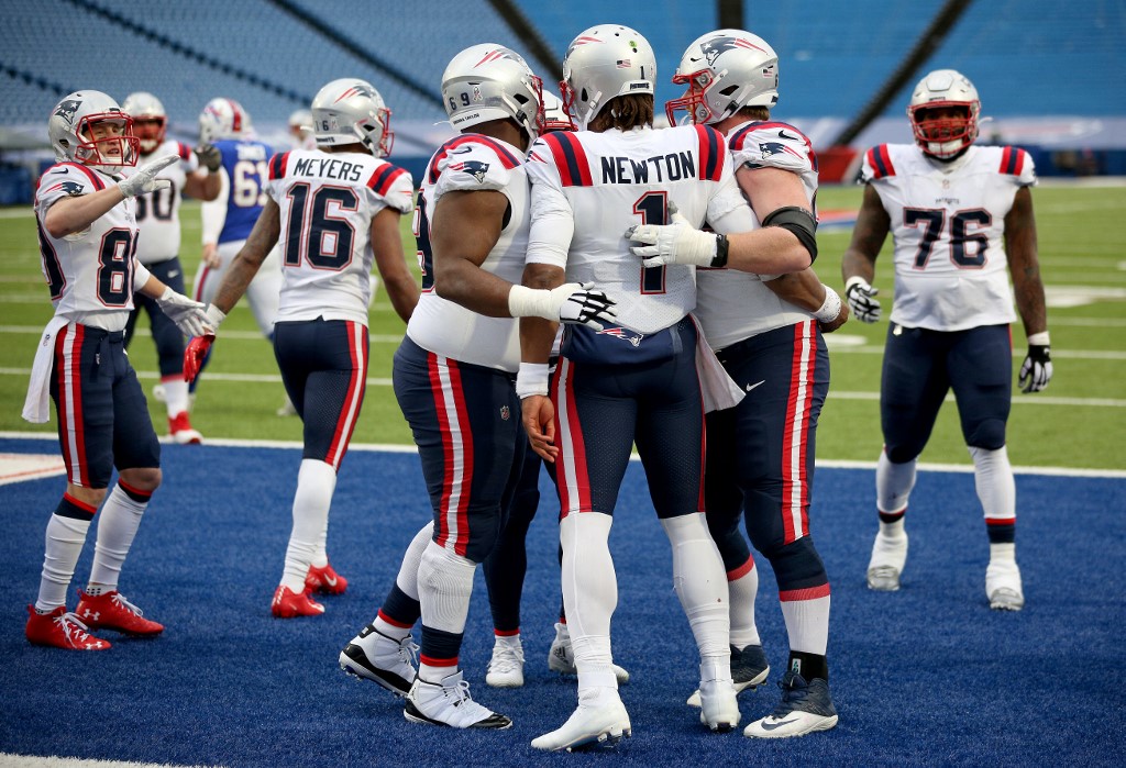 Cam Newton #1 of the New England Patriots celebrates a touchdown during a game against the Buffalo Bills