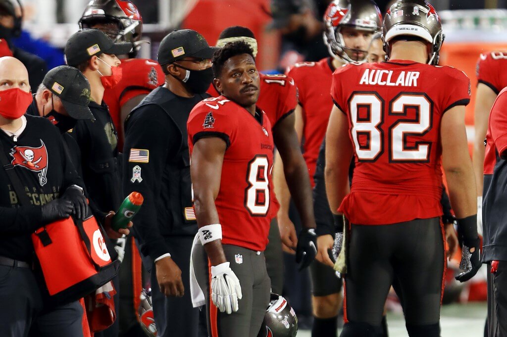 Antonio Brown of the Tampa Bay Buccaneers stands on the sideline during the second half against the New Orleans Saints