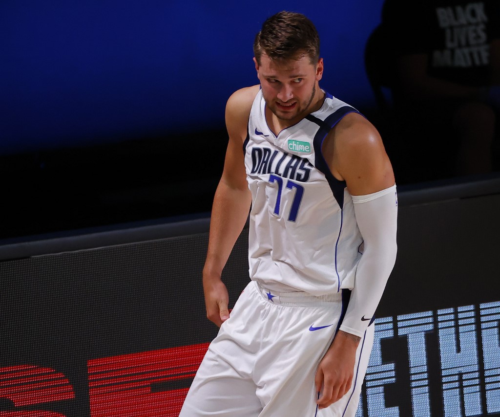 Luka Doncic of the Dallas Mavericks reacts after being charged with a foul during the third quarter. Who will win the 2021 NBA MVP award?