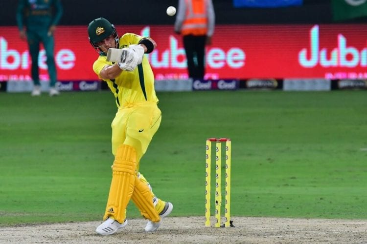 Australian cricketer Ben McDermott plays a shot during the third T20 cricket match between Pakistan and Australia