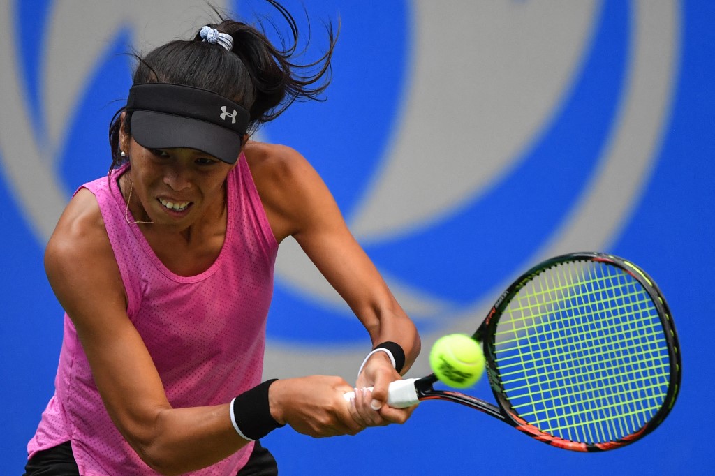 Hsieh Su-Wei hits a return against Caroline Wozniacki during 1st round women's singles. Check out the 2021 Australian Open predictions