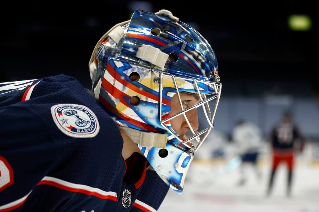 Elvis Merzlikins of the Columbus Blue Jackets warms up prior to the start of the game against the Tampa Bay Lightning