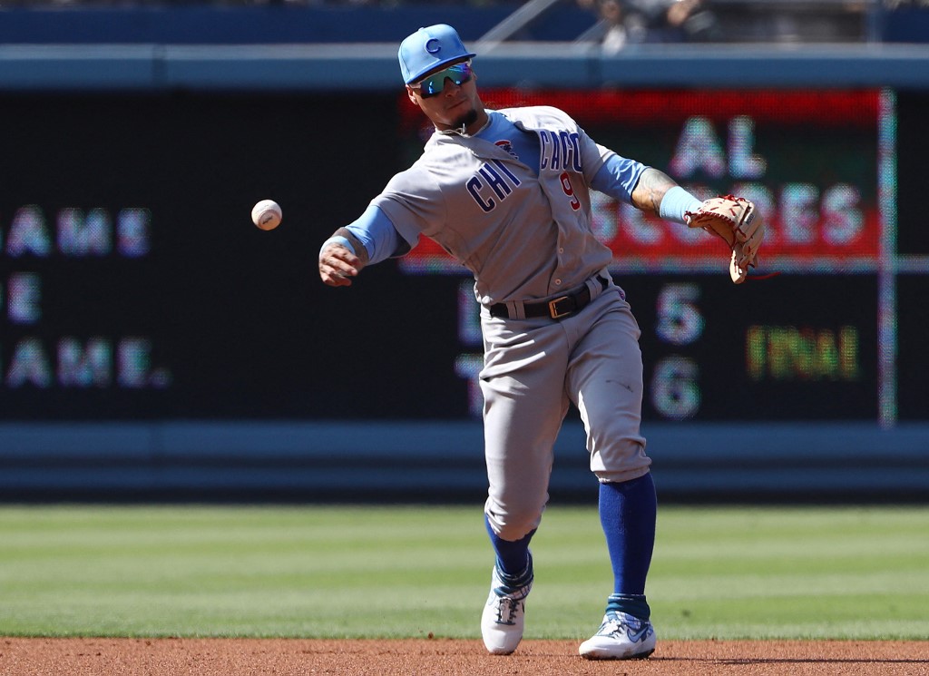 Javier Baez #9 of Chicago throws to 1st base against the Los Angeles Dodgers. Here's our Dodgers vs Cubs betting preview