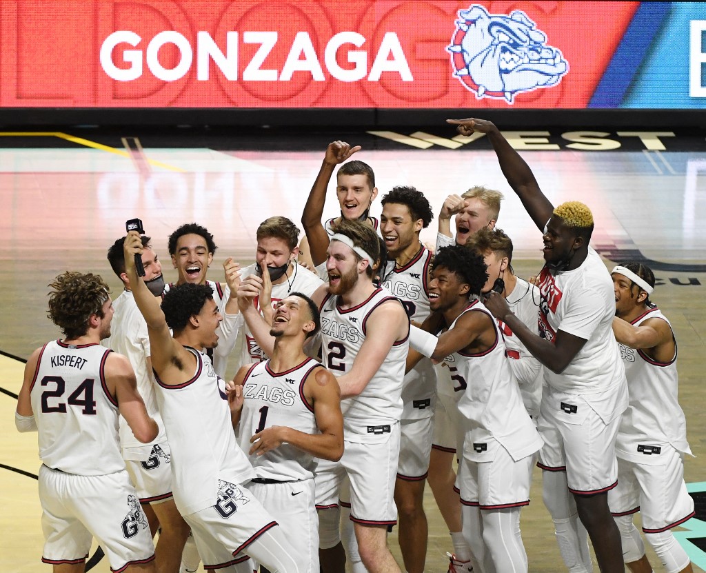 Gonzaga Bulldogs celebrate after their 88-78 win vs Brigham Young Cougars. Will they win again? Read our March Madness betting preview.