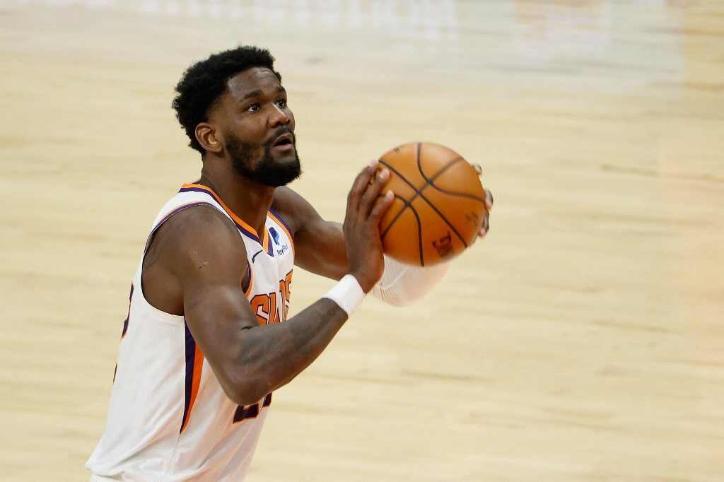 Deandre Ayton of the Phoenix Suns attempts a free-throw shot against the Atlanta Hawks during the NBA game at Phoenix Suns