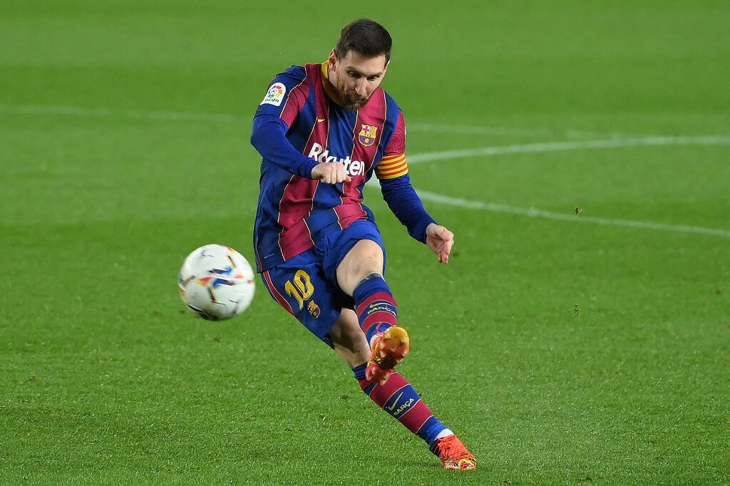 Lionel Messi kicks the ball during the Spanish League football match between Barcelona and SD Huesca
