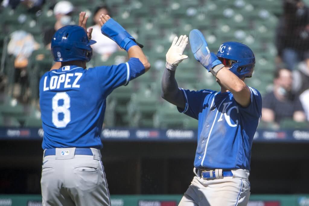 Nicky Lopez and Whit Merrifield of the Kansas City Royals celebrate against the Detroit Tigers