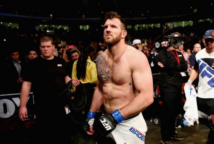 Ryan Bader of the United States leaves the Octagon after losing by TKO to Anthony Johnson of the United States