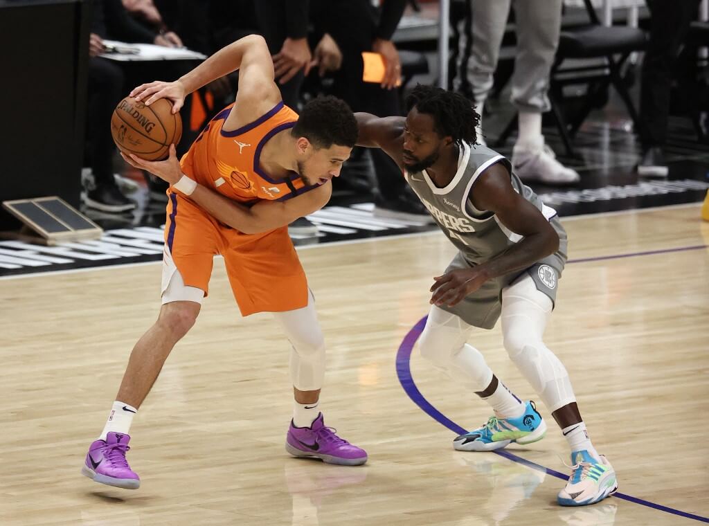Devin Booker drives against Patrick Beverley Los Angeles Clippers vs Phoenix Suns Predictions