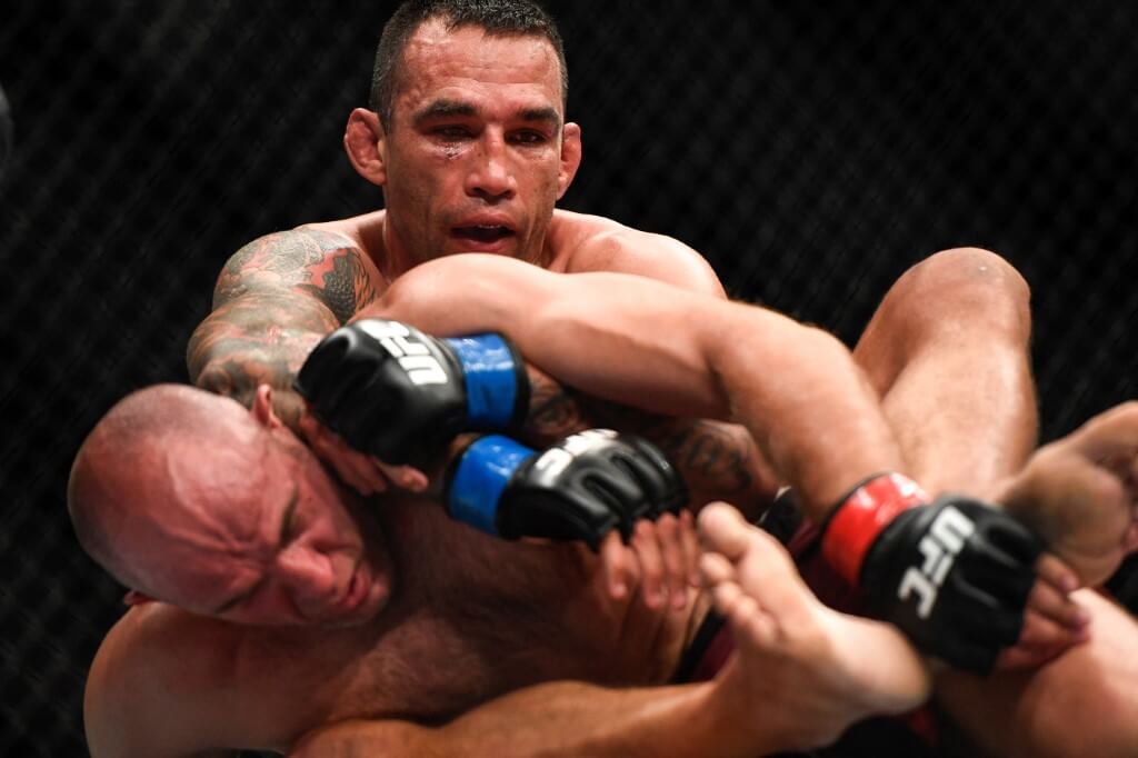 Aleksei Oleinik of Russia and Fabricio Werdum of Brazil grapple in their Heavyweight fight during UFC 249