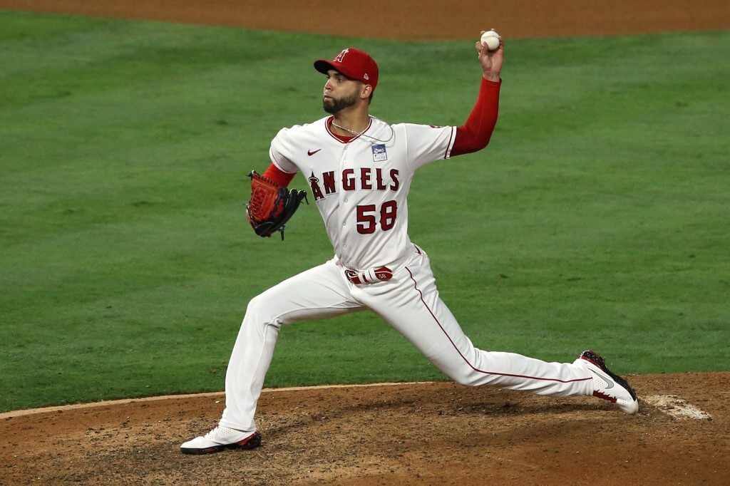 Alex Claudio of the Los Angeles Angels throws a pitch in the eighth inning against the Seattle Mariners