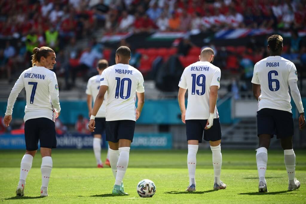 Antoine Griezmann, Kylian Mbappe, Karim Benzema and Paul Pogba prepare for a free kick during the UEFA EURO 2020