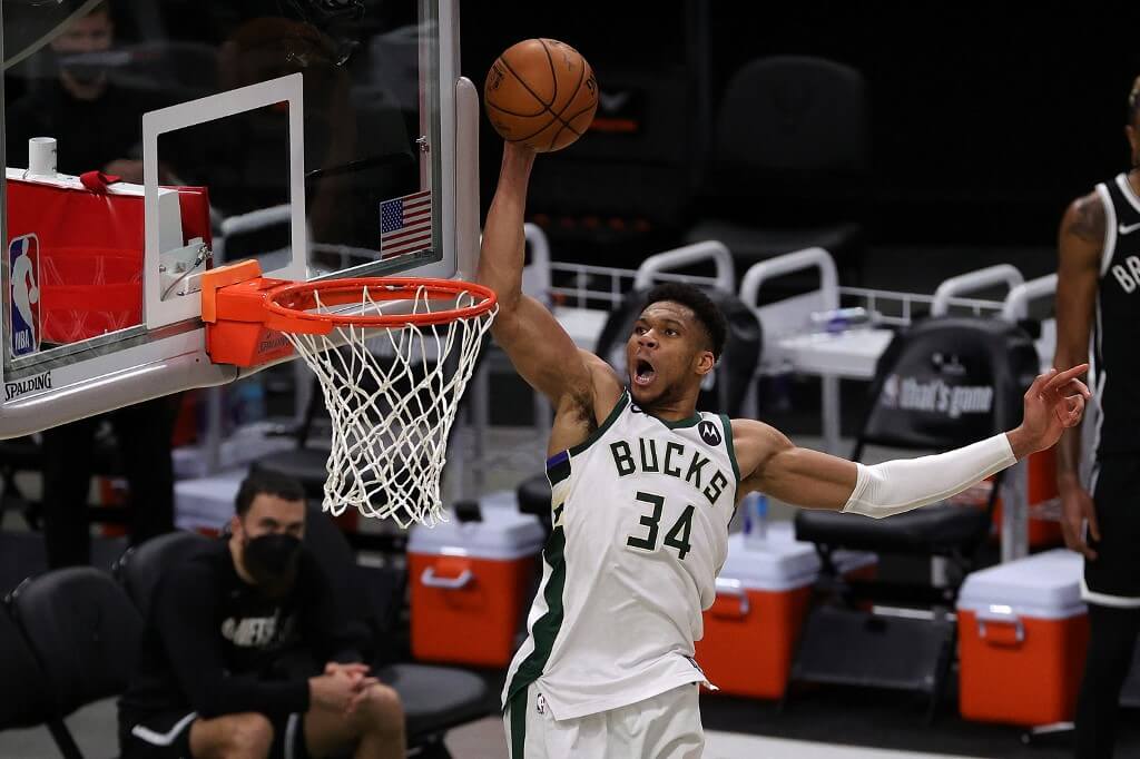 Giannis Antetokounmpo of the Milwaukee Bucks dunks against the Brooklyn Nets during the Game Four of the Eastern Conference