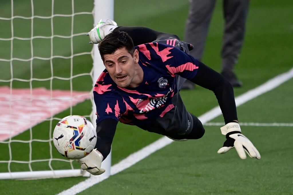 Real Madrid's Belgian goalkeeper Thibaut Courtois warms up before the Spanish League football match, Real Madrid vs Osasuna