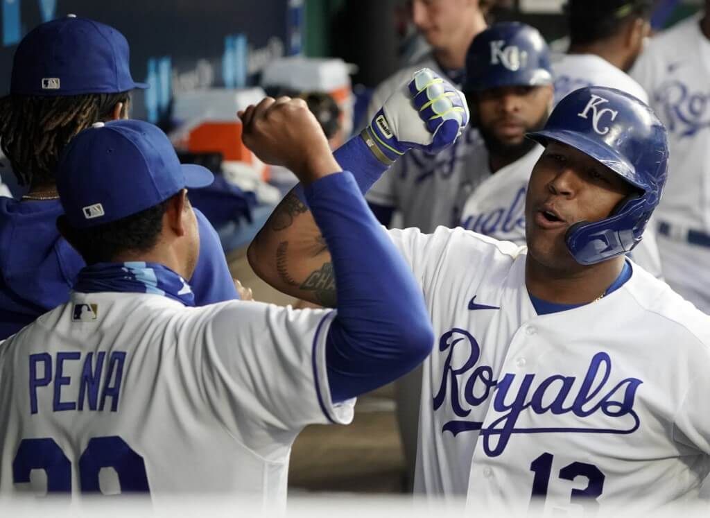 Salvador Perez of the Kansas City Royals celebrates his two-run home run with Tony Pena Jr. against the Pittsburgh Pirates