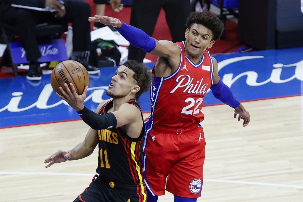 Trae Young of the Atlanta Hawks shoots under Matisse Thybulle of the Philadelphia 76ers