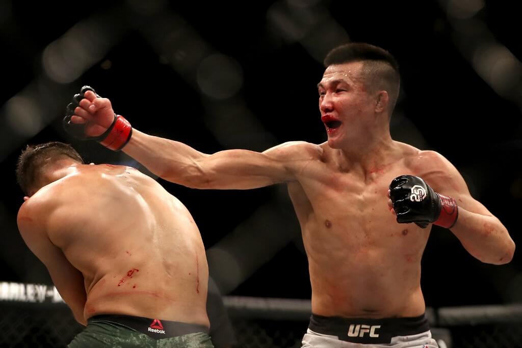 Yair Rodriguez fights Chan Sung Jung of Korea in their Featherweight bout during the UFC Fight Night