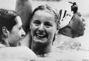 Kornelia Ender from East Germany celebrates after winning the final of the 200m freestyle in front of Shirley Babashoff