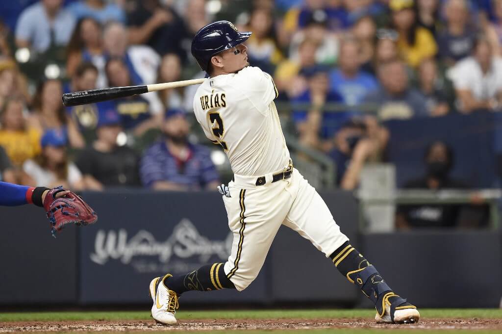 Luis Urias of the Milwaukee Brewers hits a two-run home run against the Chicago Cubs