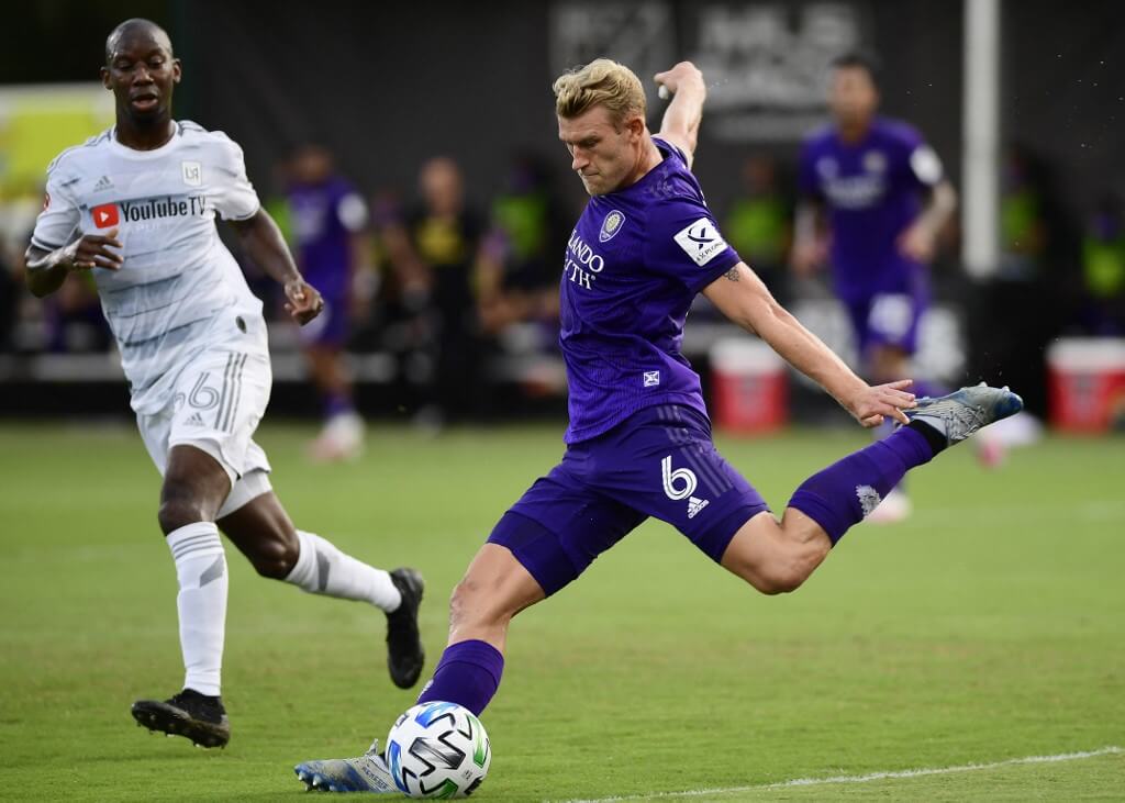 Robin Jansson of Orlando City kicks the ball during the MLS Is Back Tournament between Orlando City and Los Angeles FC