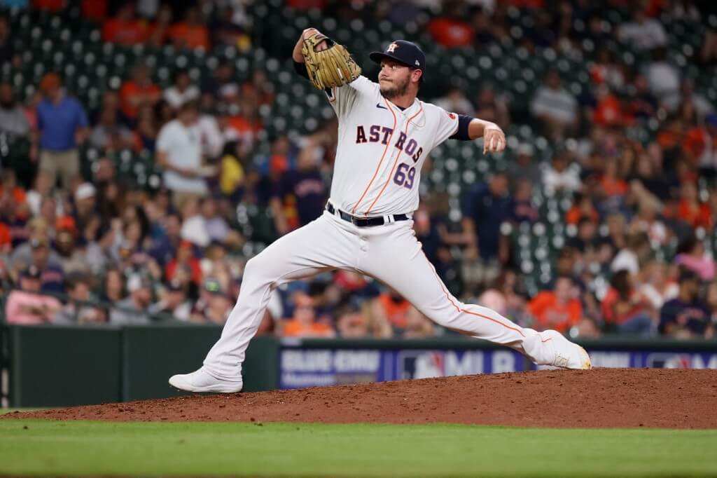 Ryan Hartman of the Houston Astros delivers during the eighth inning against the Baltimore Orioles