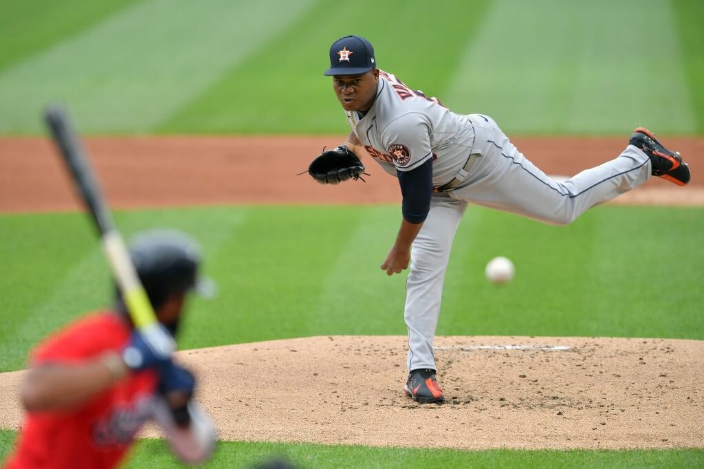 Starter Framber Valdez of the Houston Astros pitches against Amed Rosario of the Cleveland Indians