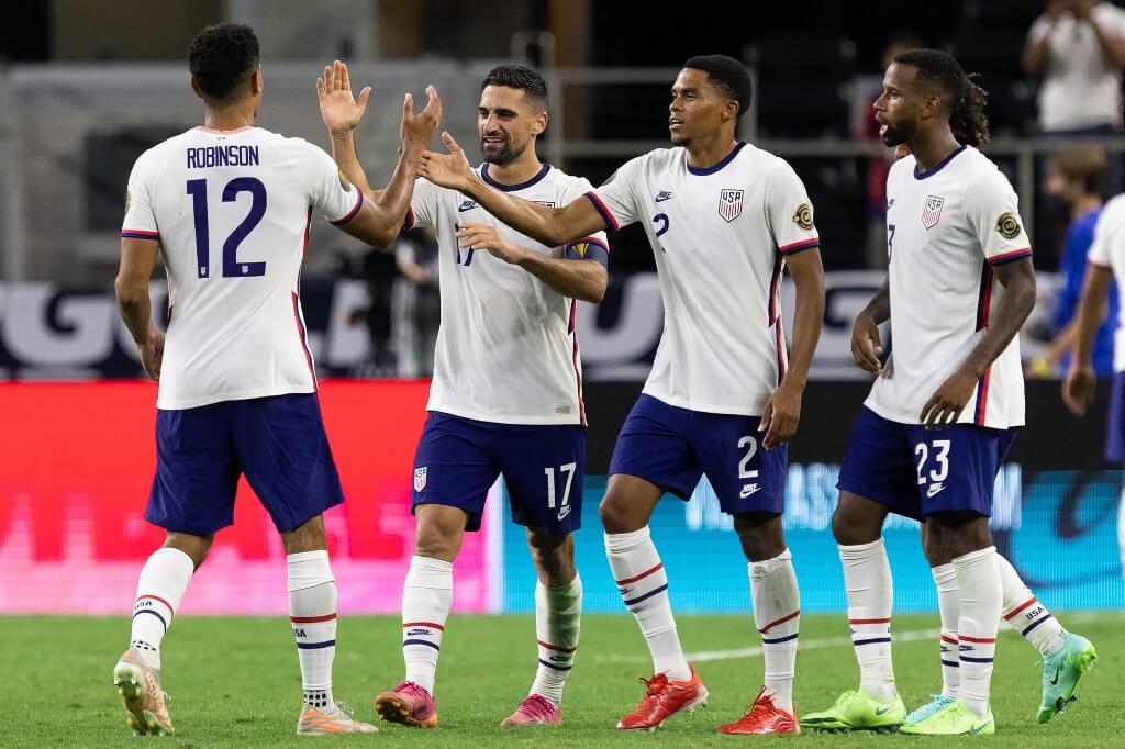 USA's Miles Robinson celebrates with teammates after beating Jamaica 1-0 following the Concacaf Gold Cup quarterfinal