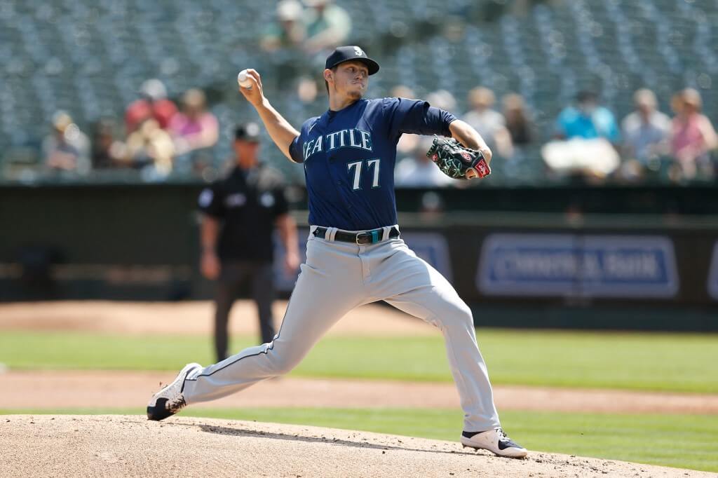 Chris Flexen of the Seattle Mariners pitches against the Oakland Athletics