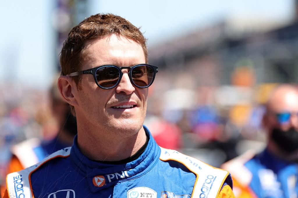 Scott Dixon of New Zealand stands on the grid prior to the 105th running of the Indianapolis 500