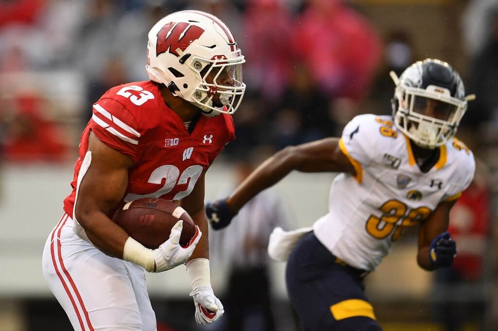 Wisconsin Badgers runs for yards during a game against the Kent State Golden Flashes at Camp Randall Stadium