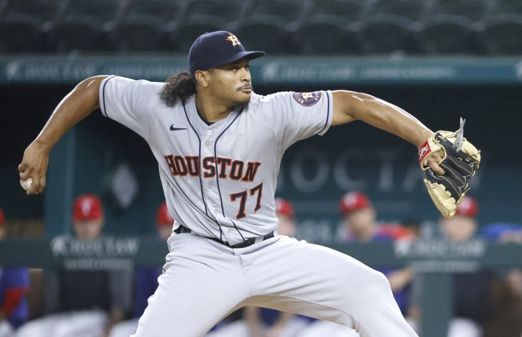 Luis Garcia of the Houston Astros pitches against the Texas Rangers