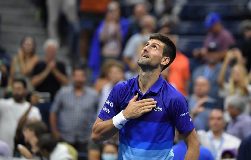 Novak Djokovic celebrates after winning the match against Matteo Berrettini