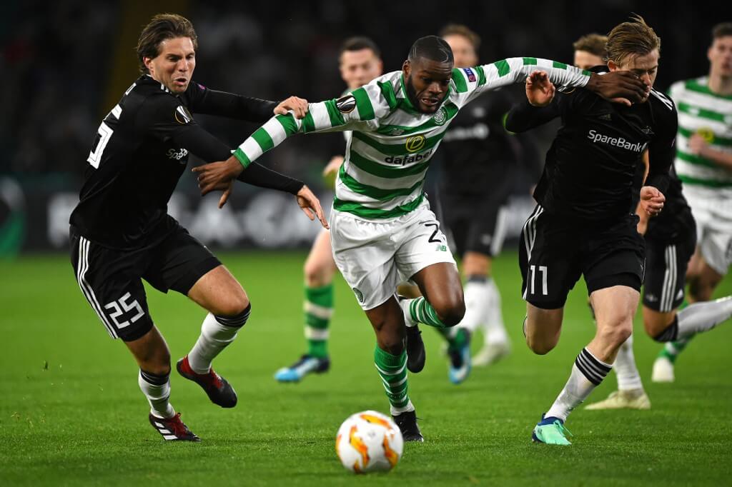 Olivier Ntcham vies with Marius Lundemo and Yann-Erik de Lanley during the UEFA Europa League football match