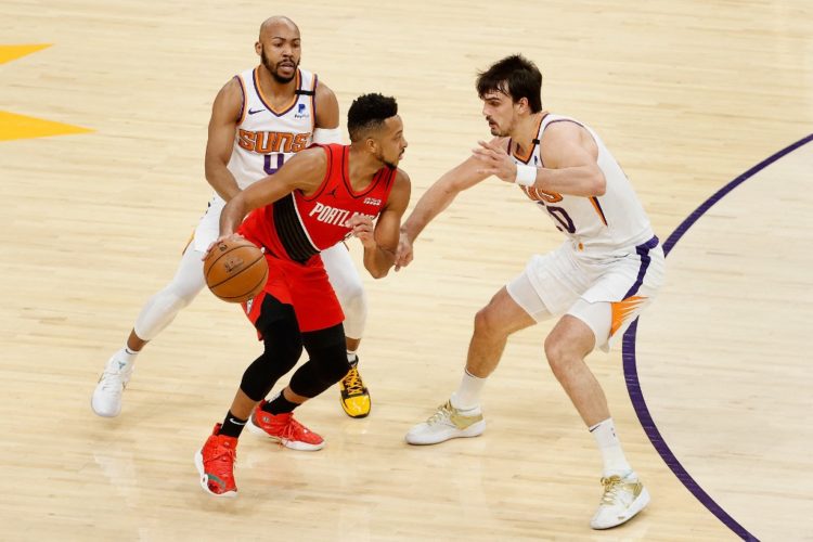 CJ McCollum handles the ball Portland Trail Blazers v Phoenix Suns