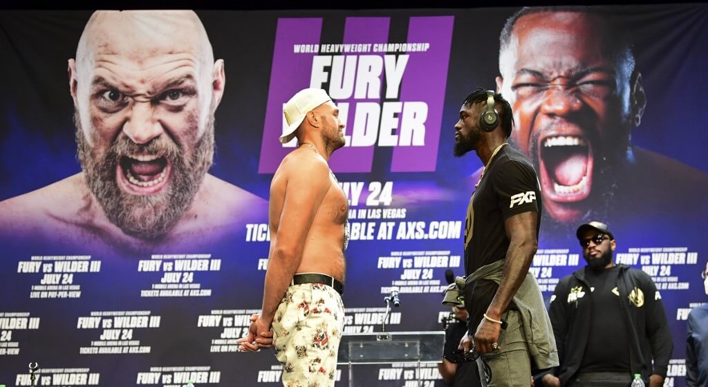 Boxers Tyson Fury and Deontay Wilder face off at a press conference