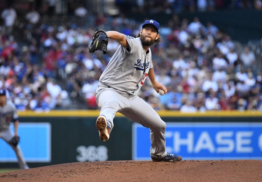 Clayton Kershaw of the Los Angeles Dodgers delivers a first inning pitch against the Arizona Diamondbacks