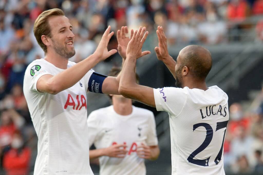 Lucas celebrates with Harry Kane after scoring during the UEFA Europa League football
