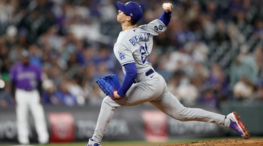 Starting pitcher Walker Buehler of the Los Angeles Dodgers throws against the Colorado Rockies