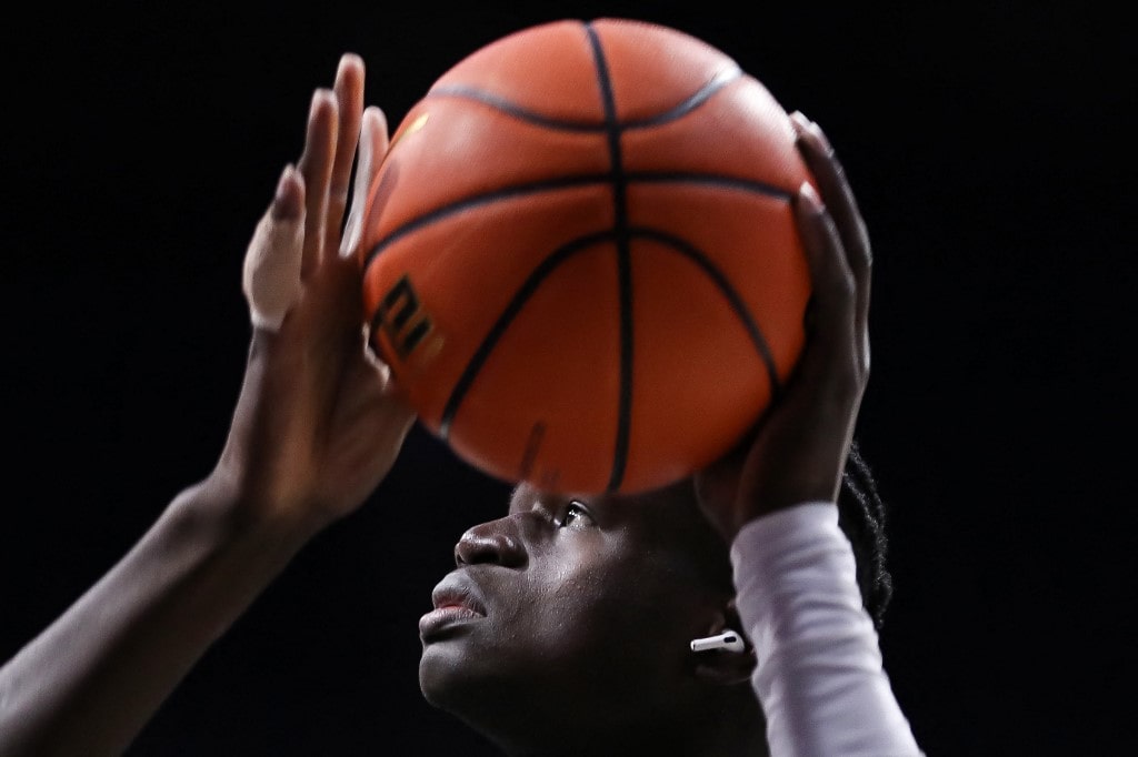 What percentage of college basketball players go to the NBA?