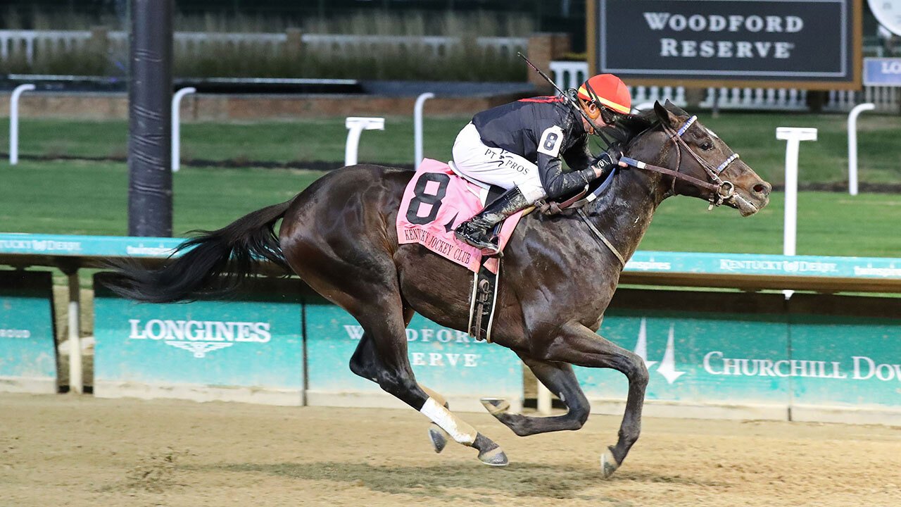 Horse Racing Bettors Smile Happy in Blue Grass Stakes