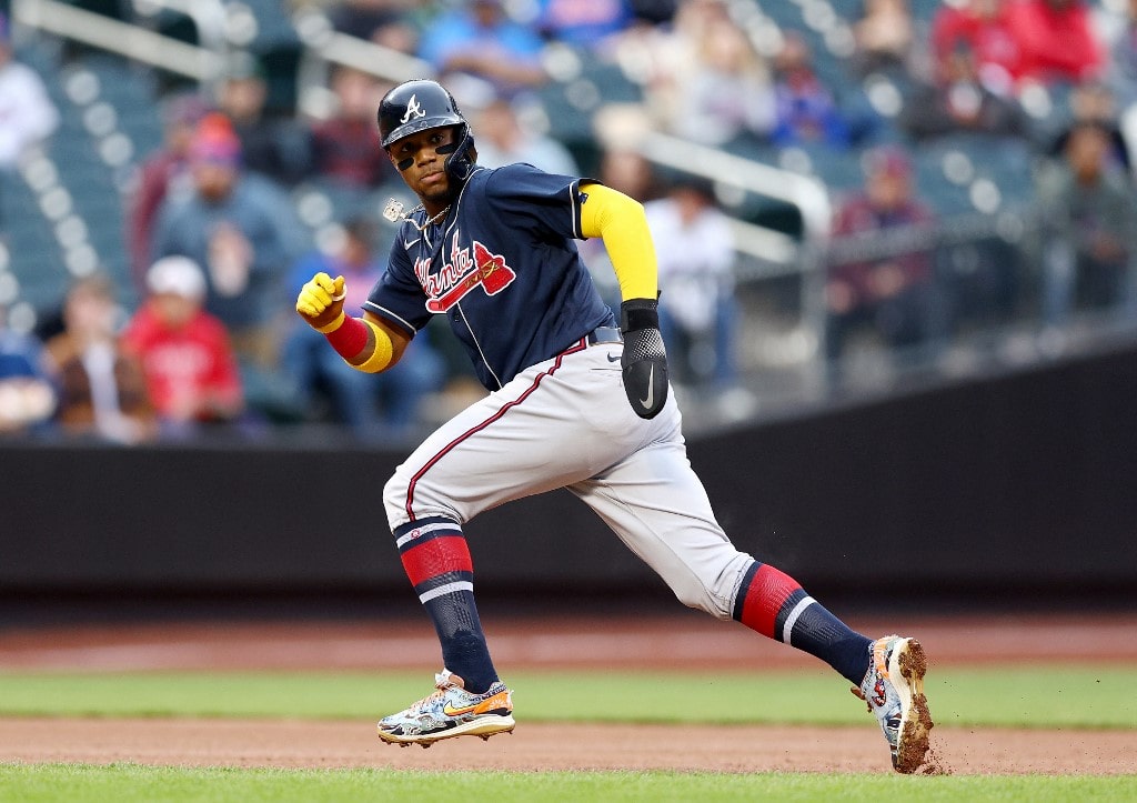  Ronald Acuna Jr. #13 of the Atlanta Braves heads for third base in the first inning against the New York Mets during game two of a double header at Citi Field on May 03, 2022 in the Flushing neighborhood of the Queens borough of New York City.