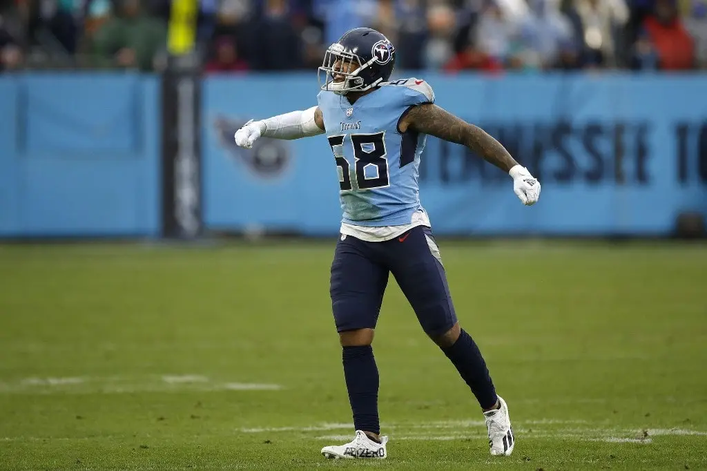 Harold Landry #58 of the Tennessee Titans celebrates after a sack during the third quarter against the Miami Dolphins at Nissan Stadium on January 02, 2022 in Nashville, Tennessee